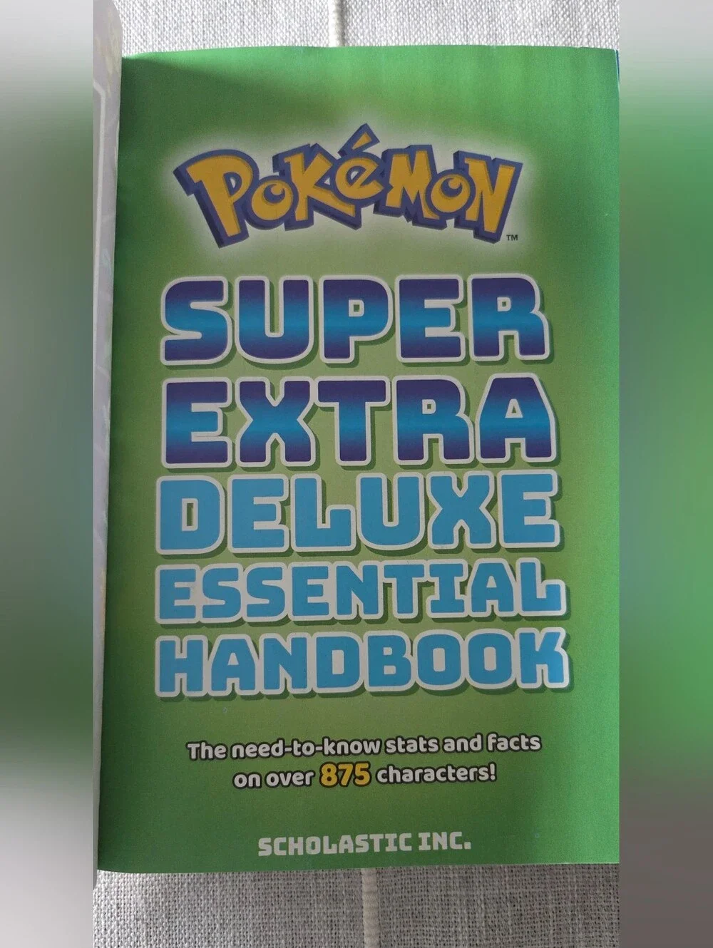 Pokémon Super Extra Deluxe Essential Handbook 2021 Scholastic Paperback